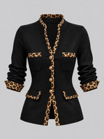 Elegante cárdigan de punto con bloques de color y paneles con estampado de leopardo