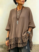 Top in maglia con scollo tondo e spalle scese con orlo arricciato con stampa leopardata