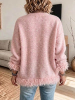 Locker sitzende Strickjacke mit V-Ausschnitt und flauschigem Fransenbesatz