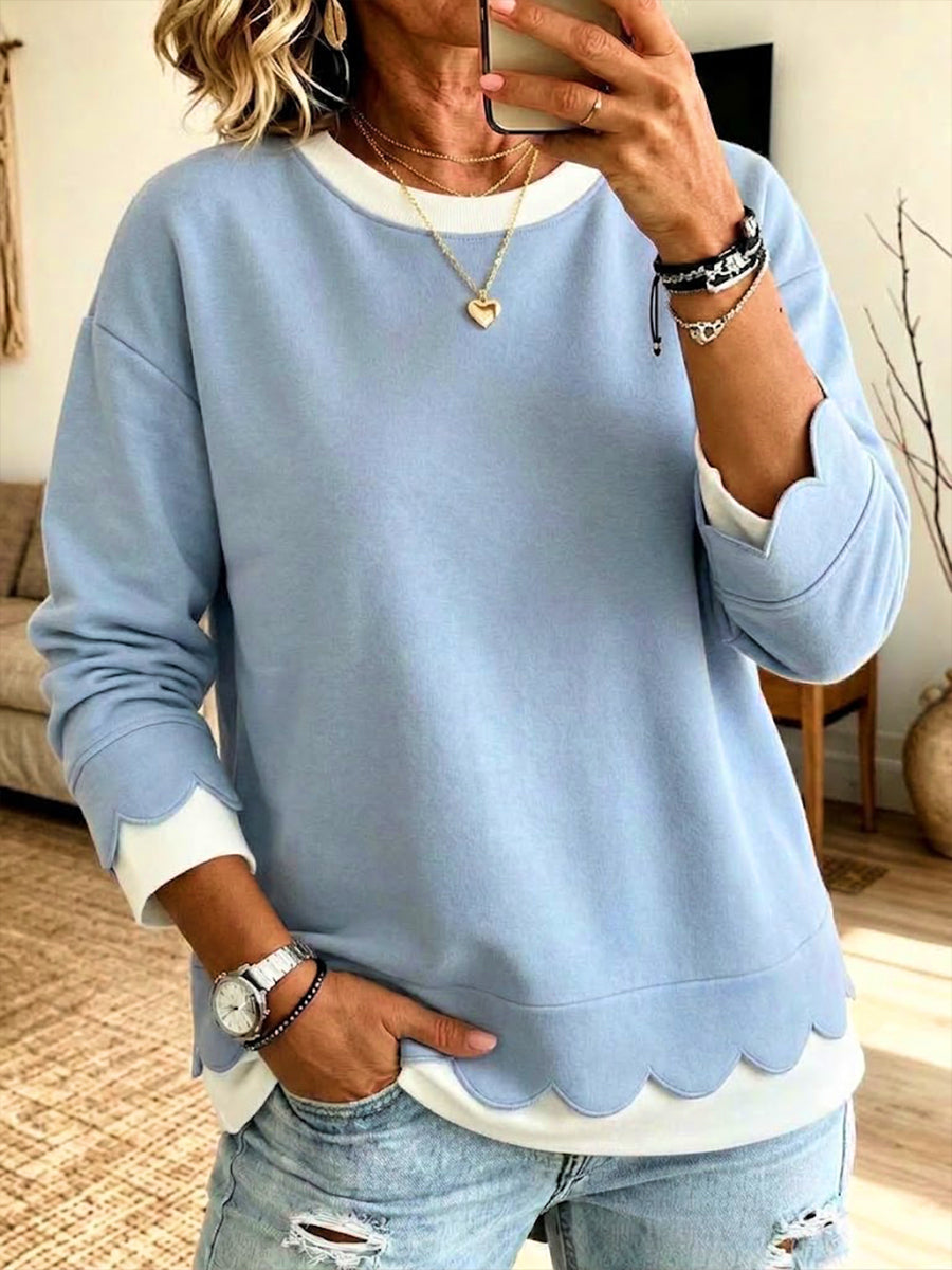 Sudadera holgada e informal con "capas sintéticas" y ribete festoneado