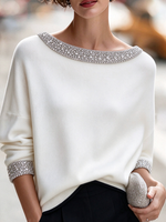 Elegante maglione lavorato a maglia con finiture in strass