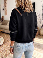 Oversized Casual Sweatshirt Featuring A Diagonal Zipper And Cut-out Details.