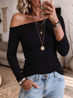 Top aderente classico a maniche lunghe con spalle scoperte da donna
