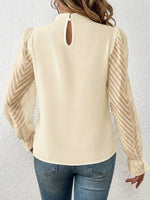 Langärmliges Oberteil mit Stehkragen und bahnenförmigem Chiffon mit Wellenmuster