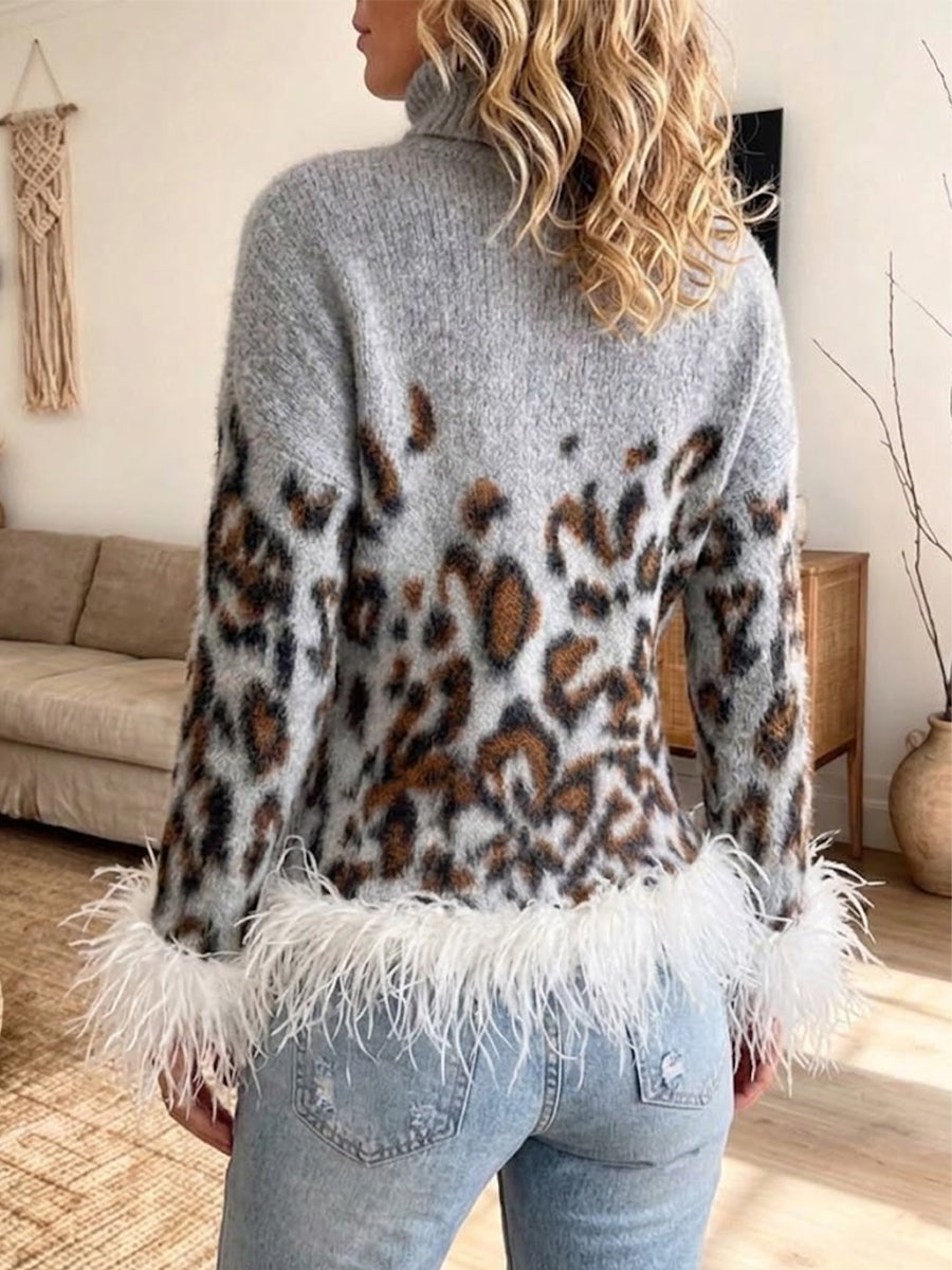 Jersey de punto con cuello alto y estampado de leopardo con ribete de plumas