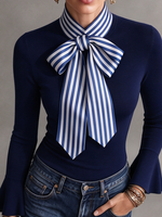Elegante top elástico con pajarita a rayas