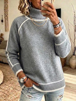 Hochgeschlossener Raglan-Strickpullover mit kontrastierendem weißen Besatz