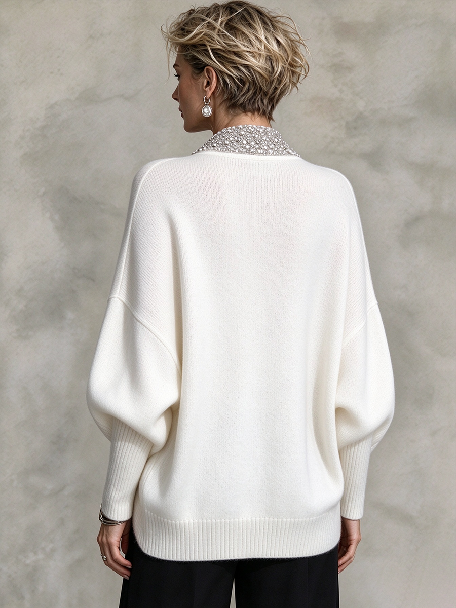 Eleganter luxuriöser Strickpullover mit V-Ausschnitt und Paillettenbesatz