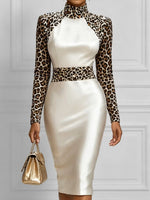 Chic Slim-fit Midi Dress Featuring Solid-color Satin And Leopard-print Paneling.