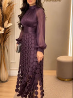 Elegantes Patchworkkleid mit Quasten