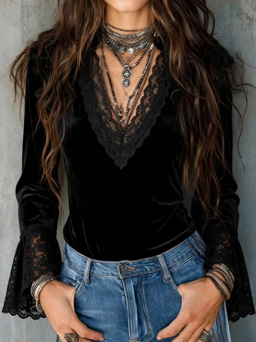 Elegante top de terciopelo negro con cuello en V y ribete de encaje floral