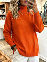 Jersey de punto holgado con cuello alto y abertura lateral