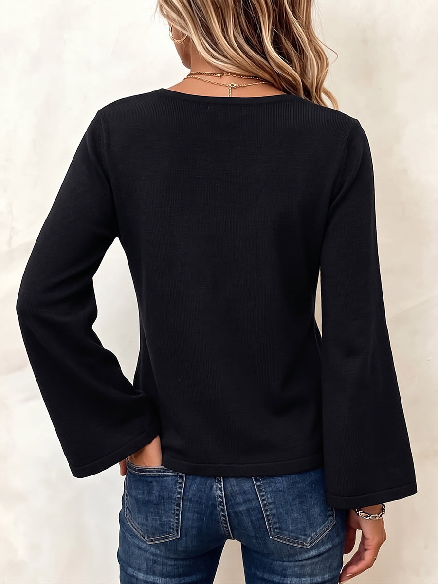 Top chic con scollo a V annodato in maglia
