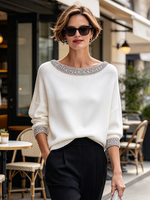 Elegante maglione lavorato a maglia con finiture in strass