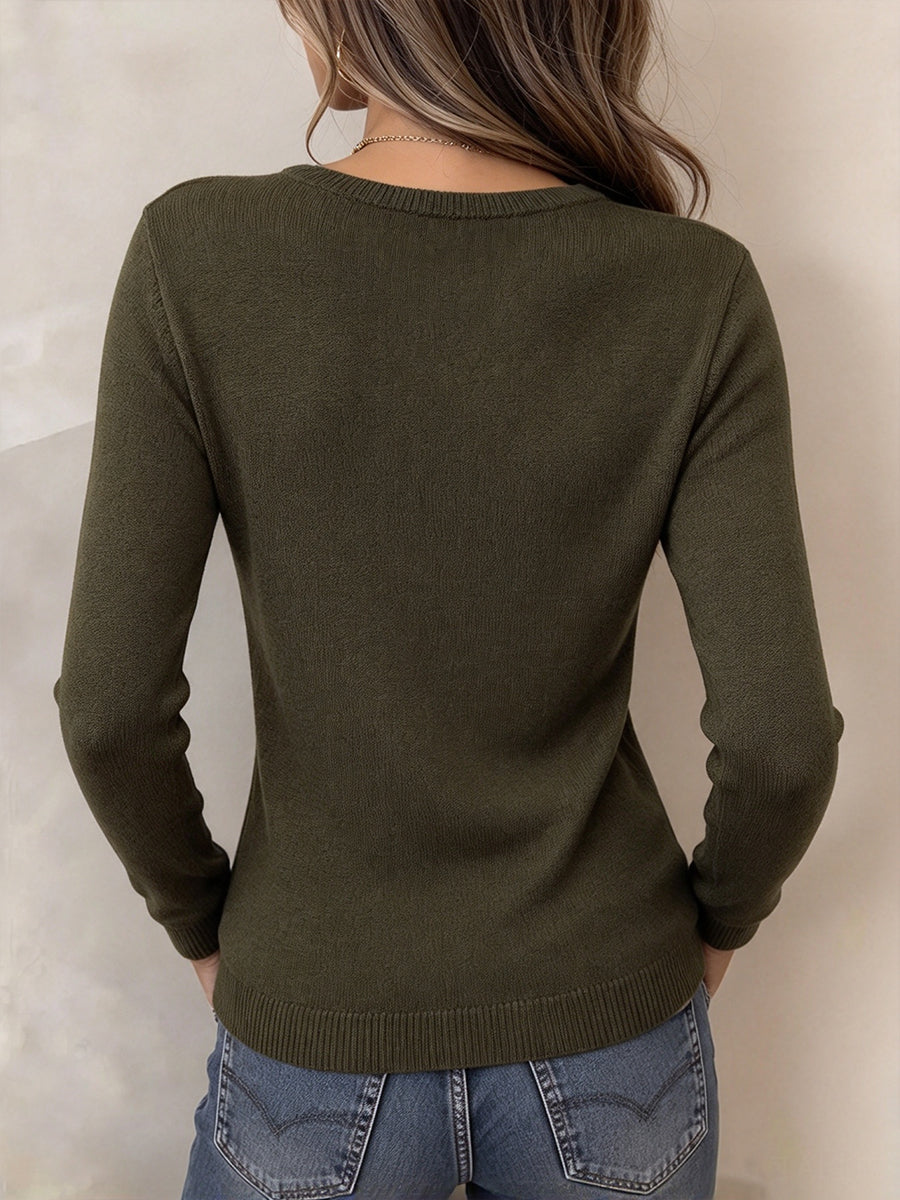 Auffälliger Riemchenpullover mit tiefem Ausschnitt