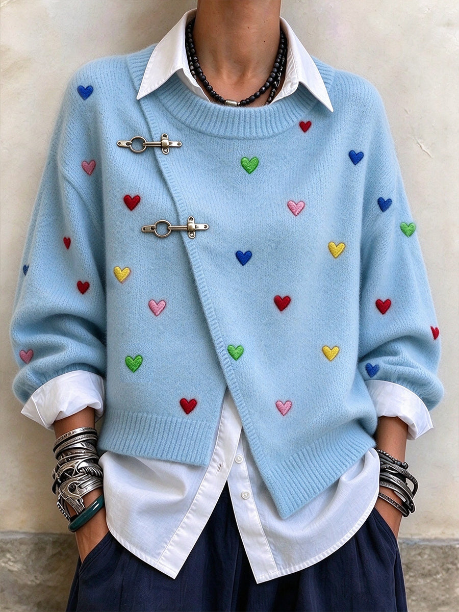 Jersey elegante asimétrico en mezcla de lana con bordado de corazones