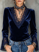 Elegante top con maniche svasate in velluto con finiture in pizzo