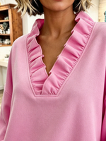 Acogedora sudadera extragrande con volantes en color rosa vibrante