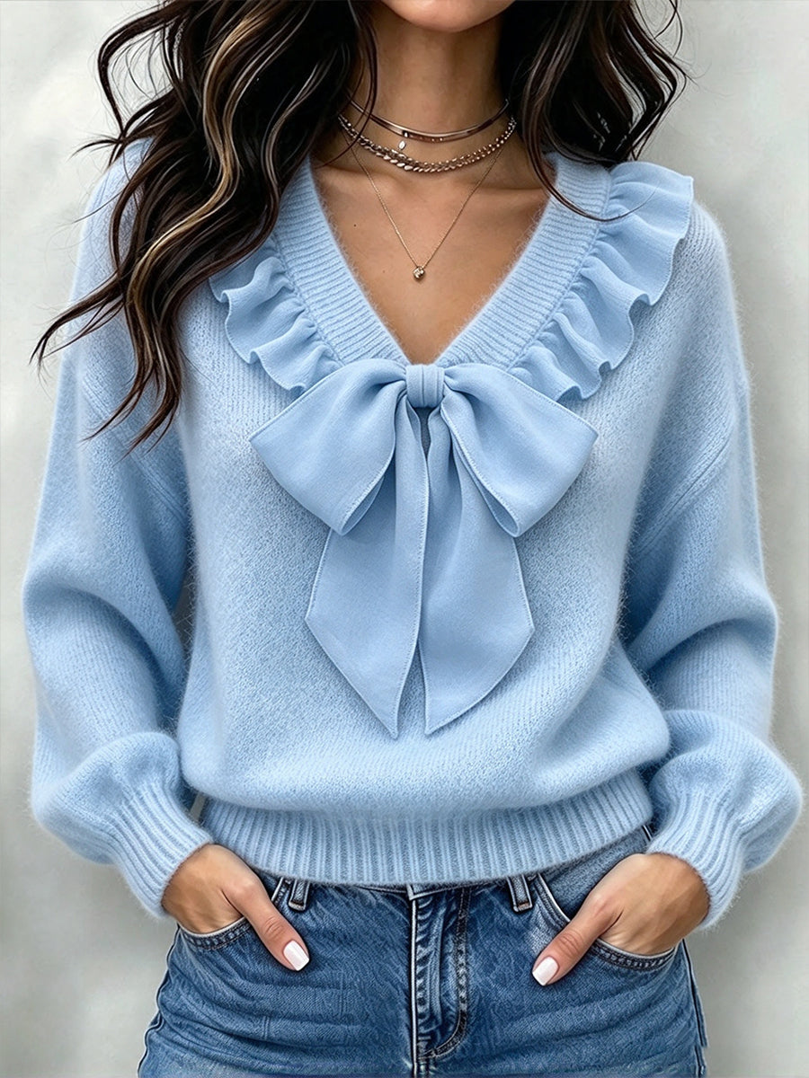 Elegante top in maglia con papillon in chiffon arricciato