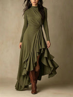 Elegante vestido midi de punto asimétrico con detalle retorcido que define la cintura