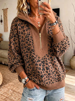 Top casual de punto con media cremallera y estampado de leopardo