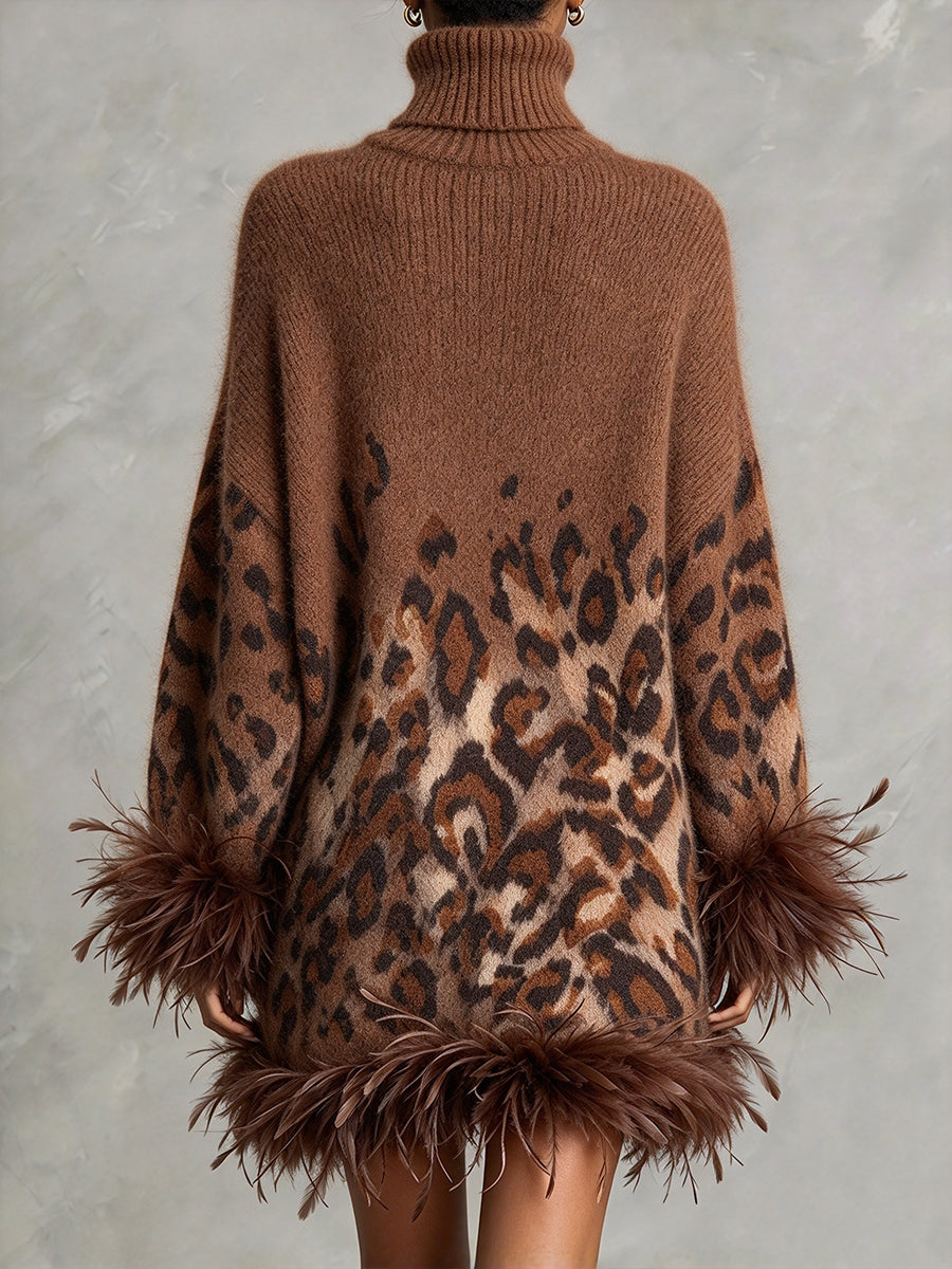 Elegante abito in maglia con finiture in piume e stampa leopardata ombré