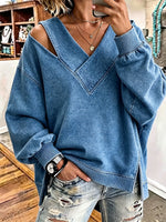 Schicker, asymmetrischer Pullover im Denim-Stil mit Ausschnitten