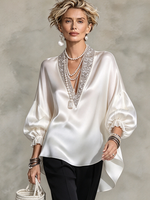 Elegante camicetta formale in raso decorata con scintillanti