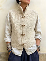 Gilet in maglia testurizzata con colletto rialzato e chiusure a levetta