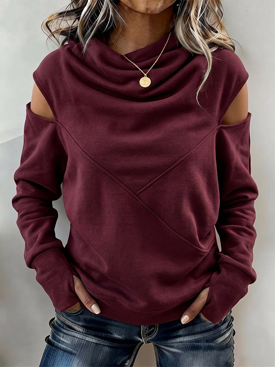 Top elegante con cuello vuelto y hombros descubiertos