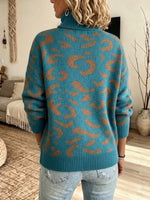 Offen gestrickter Langarmpullover mit V-Ausschnitt und federartiger Textur