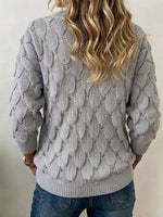 Jersey de punto abierto con cuello en V y manga larga con textura tipo pluma