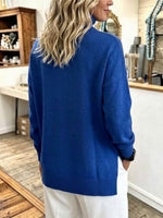 Jersey de punto holgado con cuello alto y abertura lateral