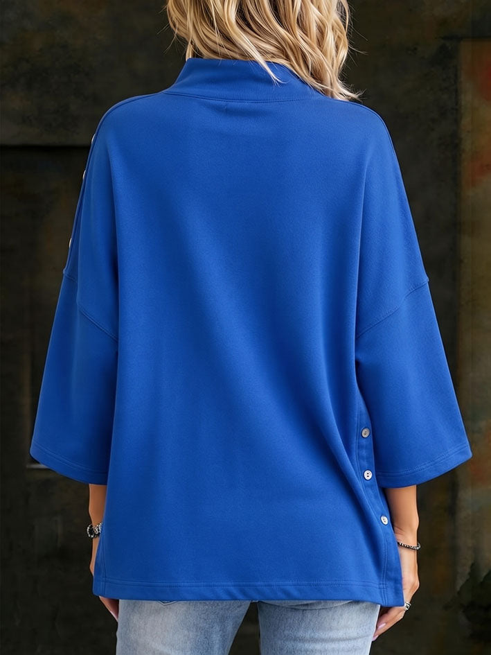 Top casual a collo alto con bottoni blu vivace