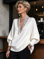 Eleganter luxuriöser Strickpullover mit V-Ausschnitt und Paillettenbesatz