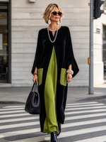 Elegante abito in velluto color block dal taglio artistico