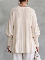 Top in maglia ampio girocollo con maniche a lanterna testurizzate