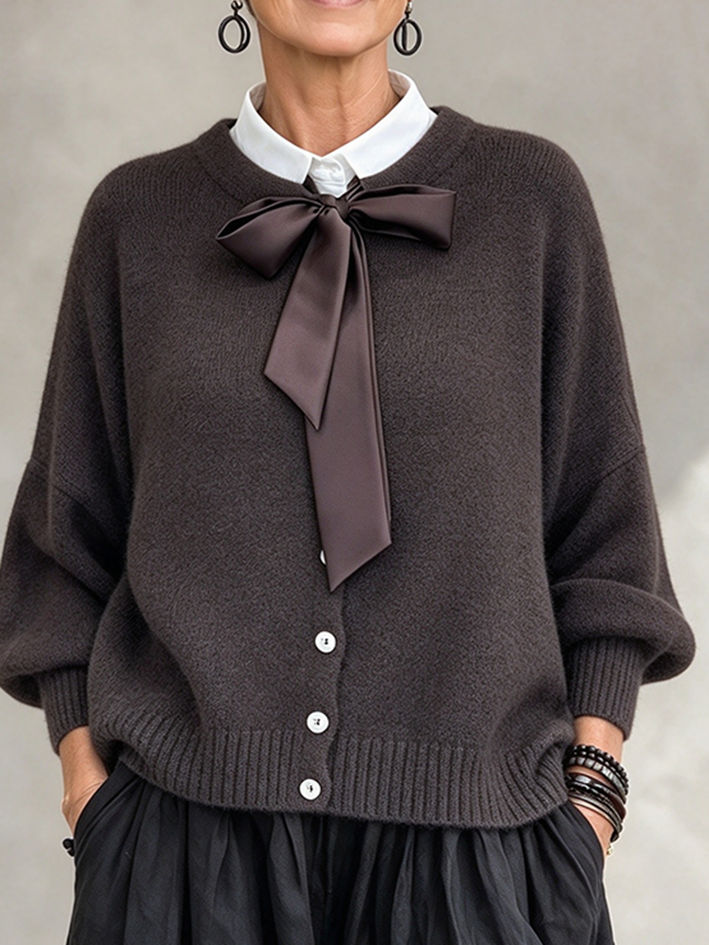 Cardigan in maglia con fiocco casual ed elegante