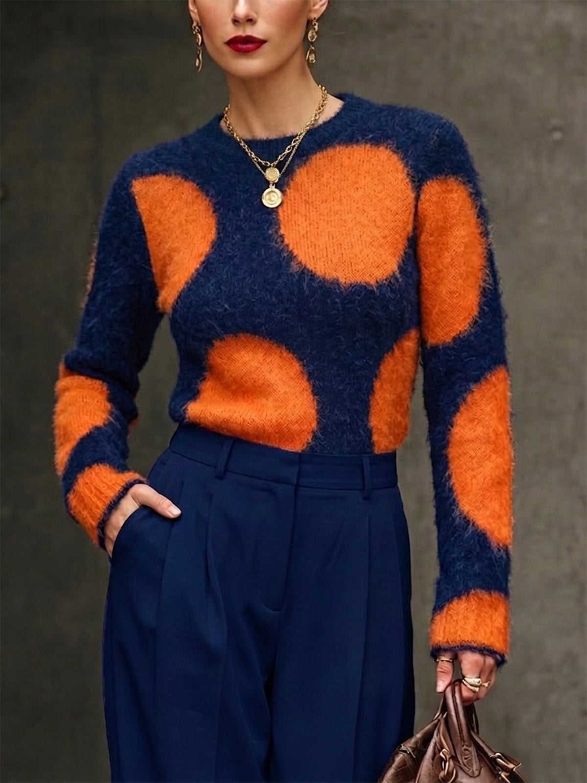 Top chic in maglia a pois grandi