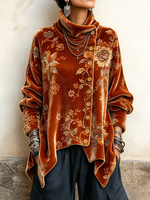 Top de terciopelo asimétrico con estampado floral elegante
