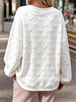 Pullover con scollo a V con cuore 3D testurizzato
