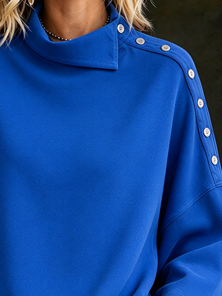 Top casual a collo alto con bottoni blu vivace
