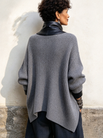 Gemütliche, stilvolle Strickjacke aus Kunstleder