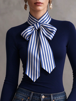 Elegante top elástico con pajarita a rayas