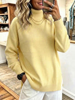 Jersey de punto holgado con cuello alto y abertura lateral