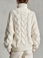 Kuscheliger und warmer Rollkragenpullover mit Pailletten und Zopfmuster