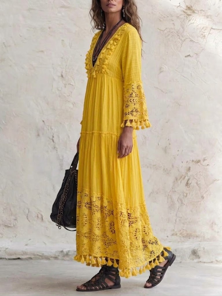 Vestido largo bohemio de encaje con recortes y borlas