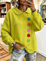 Felpa ampia con colletto alla Peter Pan e bottoni colorati