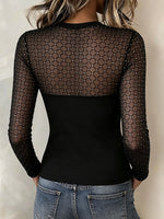 Top con frange in rete di strass abbaglianti