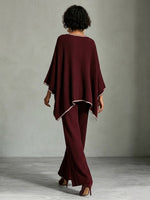 Loose And Cozy Two-piece Set Featuring A Ribbed Knit Top And Pants With Contrasting Piping.
